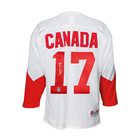 Camiseta de la Summit Series de 1972 firmada por Bill White del equipo de Canadá