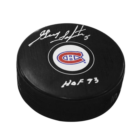 Disco de los Montreal Canadiens firmado por Guy Lapointe con nota del Salón de la Fama