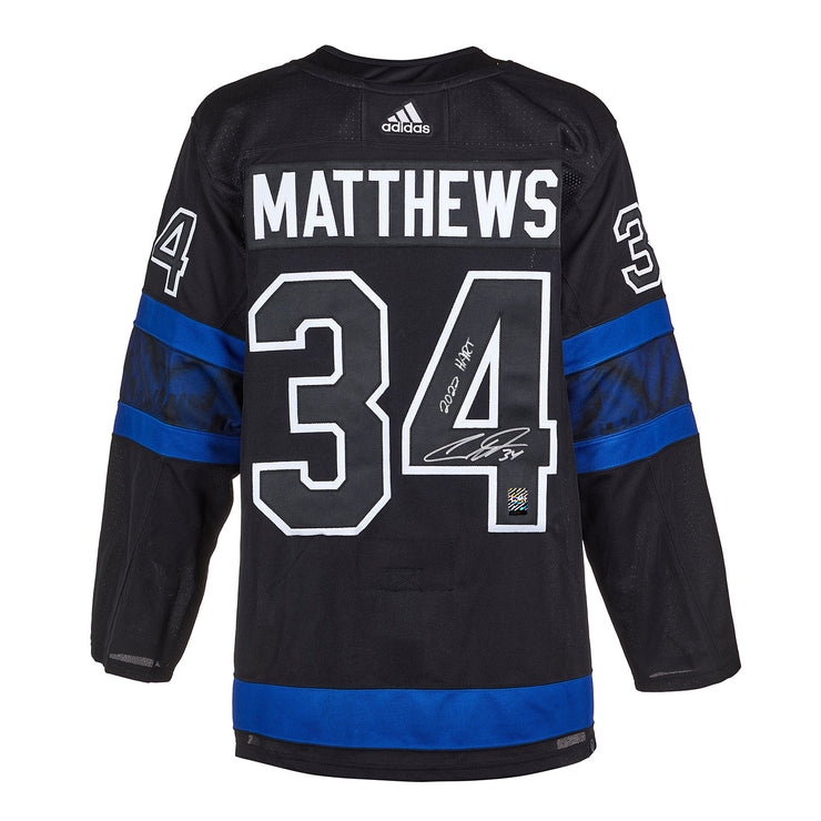 Camiseta Adidas Pro Flipside de los Toronto Maple Leafs firmada por Auston Matthews con la inscripción "2022 Hart"