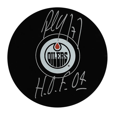 Disco firmado por Paul Coffey de los Edmonton Oilers