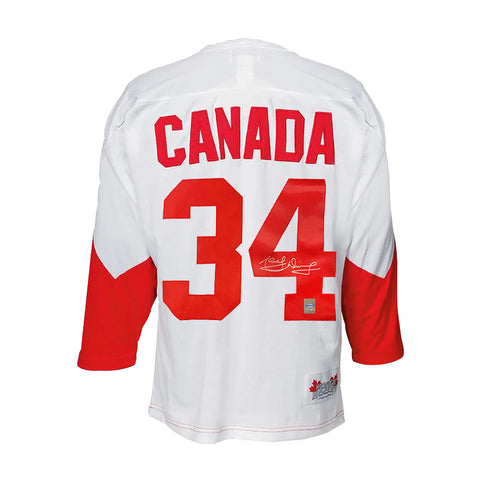 Camiseta de la Summit Series de 1972 firmada por el equipo de Canadá de Marcel Dionne